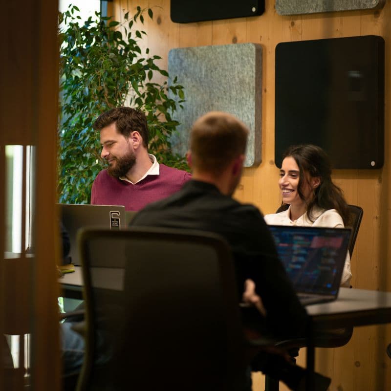 Unica team collaborating on product development